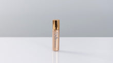 Load image into Gallery viewer, Roller Rollon Essential Oil in Gold Bottle
